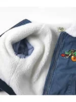 An inside view of the Breeze x Dragon Ball blue denim jacket showing the soft white sherpa lining.