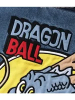 A close-up view of the high-quality embroidered patches on the Breeze x Dragon Ball blue denim sherpa jacket.