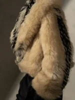 Side view of the 2026 Erin Andrews viral fur coat and shawl collar.