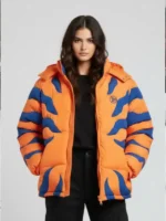 Close-up of the front design on the orange Digimon Greymon puffer jacket by TV Jackets.