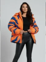 Detail view of the zipper closure on the orange Digimon Greymon puffer jacket by TV Jackets.