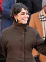 Close-up detailing of the buttons and funnel collar on the Rama Duwaji brown coat.