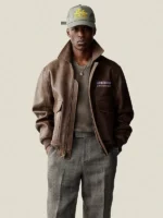 Profile view of the Aimé Leon Dore flight jacket highlighting the shirt-style down collar.