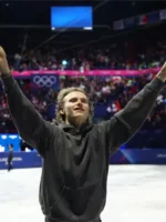 A full view of the grey pullover hoodie representing the American figure skater’s 2026 Olympic journey.