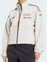 A high-performance white Audi Revolut F1 track jacket with stand-up collar and team branding.