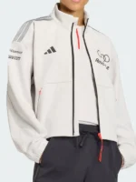 Close-up of the front zipper closure and stand-up collar on the Audi Revolut F1 team track top.