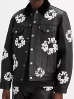 Artistic shot of the Levi's x Denim Tears leather jacket focusing on the sleeve and cuff detail.