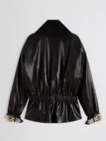 Back view of Mariah Carey black leather jacket showing the sleek drape and fine stitching of the genuine leather.
