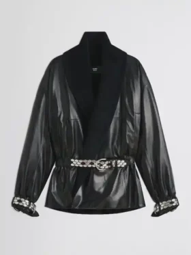 Front view of Mariah Carey black leather jacket featuring a dramatic shawl collar and adjustable belted waist.