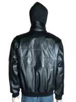 A stylish black streetwear jacket with red WWE Raw Is War branding and collaborative sleeve graphics.