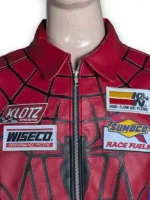 Close-up of spider-man inspired racing leather jacket with embroidered patches.