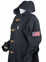 Front view of a Team USA navy blue duffle coat with the official Olympic shield and white polo horse embroidery on the chest.