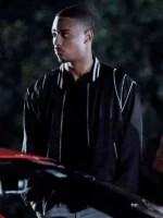 Close-up of the black satin fabric and ribbed cuffs on the Keith Powers inspired jacket.