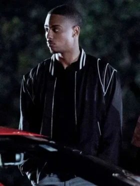 Close-up of the black satin fabric and ribbed cuffs on the Keith Powers inspired jacket.