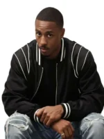 Front view of the black satin bomber jacket inspired by Keith Powers in the movie The Gates.