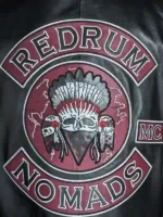 Close-up of a premium leather vest highlighting the hook and eye front closure and reinforced seams.