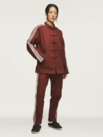 A model wearing the fox brown Adidas jacket for the 2026 Year of the Horse.