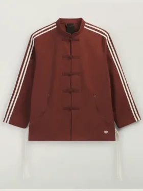 The front view of the fox brown Adidas CLOT jacket with traditional knot buttons.