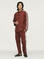 A model wearing the full Edison Chen Adidas 2026 collection in fox brown.