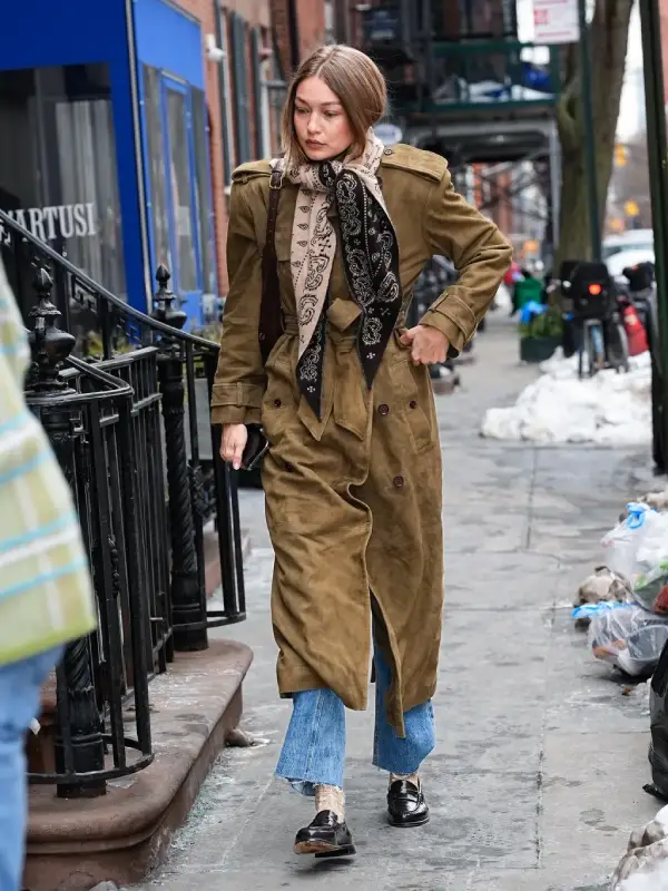 Gigi Hadid Brown Suede Trench Coat NYC Street Style Gigi Hadid's iconic NYC street style look featuring the long brown suede trench coat.
