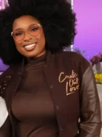 Close-up of the Jennifer Hudson varsity jacket showing the wool texture, leather sleeves, and rib-knitted collar.