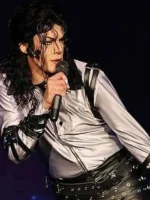 The flexible rib-knitted hemline at the bottom of the metallic silver MJ jacket.