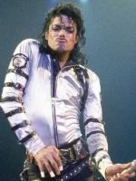 A high-resolution studio photograph of the metallic silver MJ satin jacket.
