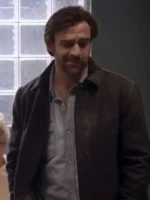 Close-up of Remi Carter Black Jacket shirt-style collar and classic buttoned closure