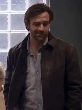 Close-up of Remi Carter Black Jacket shirt-style collar and classic buttoned closure