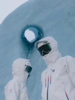 A front view of the Winter Olympics 2026 Iceland Jacket in a stark snowy white.