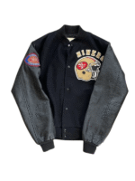 A sleek black version of the 49ers vintage letterman jacket with black leather sleeves and golden helmet logo.