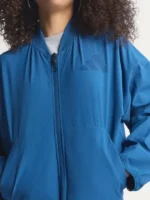 Close-up of the fabric on the Adidas Babymonster Jacket.