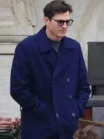 Close-up of the front closure on the Ashton Kutcher The Beauty Blue Peacoat.