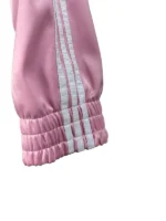 Sophisticated full-length sleeve jacket with unique tie closure.