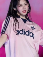 Close-up of the fabric on the Babymonster Rora Adidas Collared Goalie.