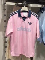 A full style look of the Babymonster Rora Adidas Collared Goalie.