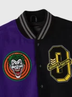 Close-up of the front design on the OVO Batman Joker Split Varsity Jacket.