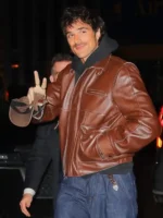 Shopping view of the Jacob Elordi brown leather jacket with buttoned closure.