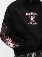 Close-up of the hood closure on the Spider Crest Hoodie.