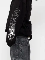 Side profile of the Spider Crest Hoodie.