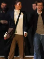 Close-up of the front closure on The Drama Zendaya Black Coat.