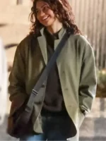 Close-up of the front closure on the Zendaya Green Jacket.