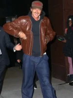 Close-up of the Jacob Elordi brown leather jacket with buttoned over zipper detail.