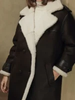 Close-up of the front closure on the Womens Oversize Merino Shearling Coat.