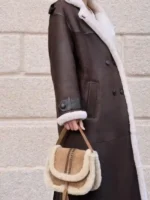 Side profile of the elegant Womens Oversize Merino Shearling Coat.