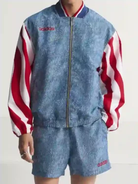 Front view of Adidas Denim Graphic Track Top with zipper closure, rib collar, and striped full-length sleeves