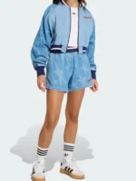 Adidas blue Denim Graphic Varsity Bomber Jacket in premium denim with star print accents and rib-knit details