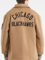 The back view of the CM Punk brown wool jacket showing the clean stitching and wool texture.