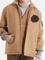 Front perspective of the CM Punk Blackhawks jacket with rib-knitted cuffs and side pockets.