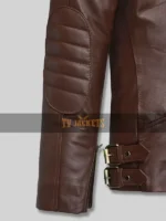 Close-up of quilted elbow patch and buckle cuff detail on Grace Ashcroft brown leather jacket